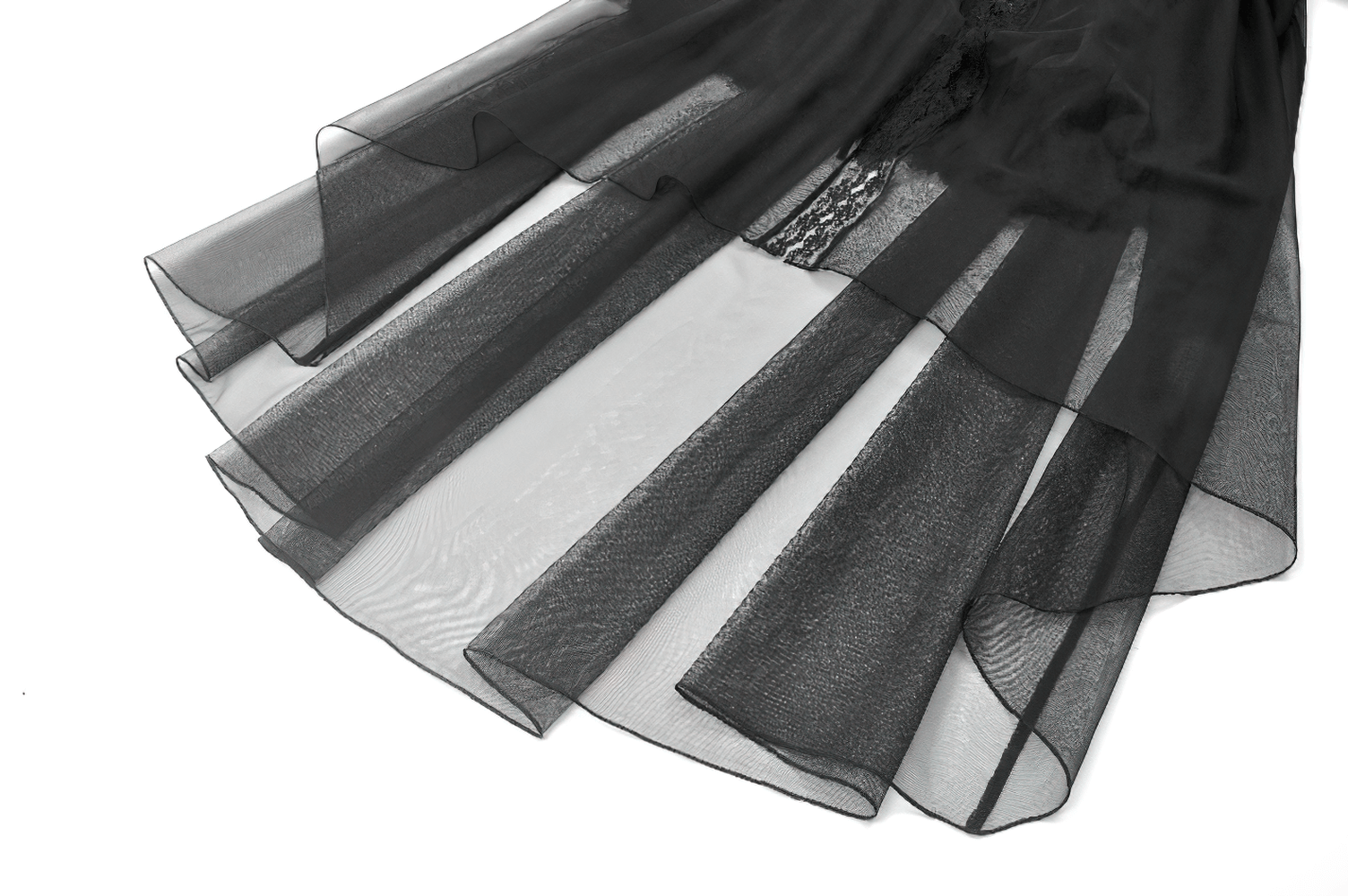 Close-up of a sheer black skirt layer showcasing delicate tulle fabric for a gothic or Victorian-inspired look.