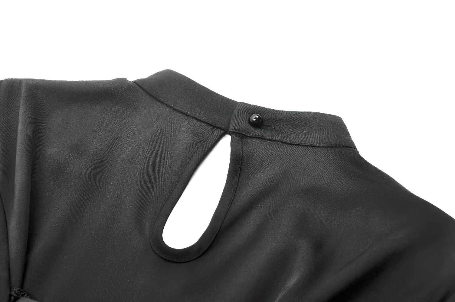 Back of a chic black lace and satin dress featuring a button closure and keyhole design.