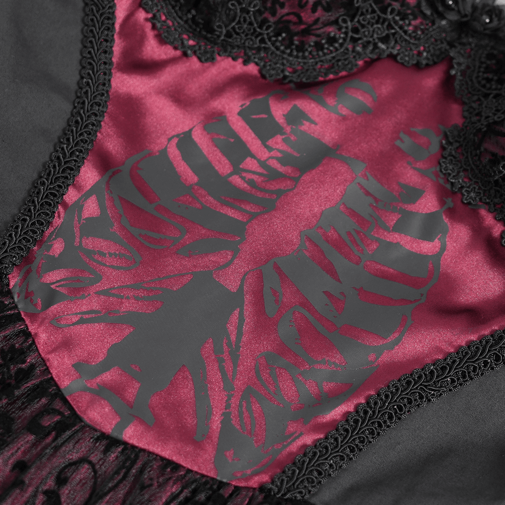 Close-up of black and burgundy corset dress featuring intricate lace and striking skeleton print.