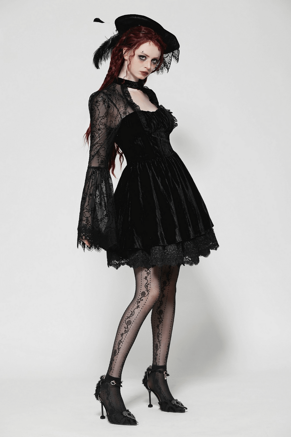 Elegant gothic black lace dress with flared sleeves and unique rose details, perfect for dramatic evening looks.