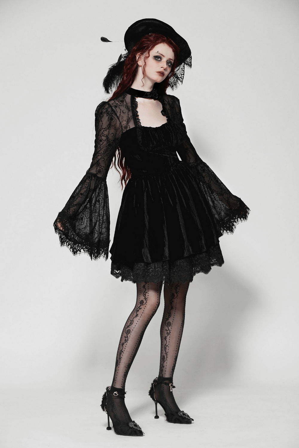 Elegant gothic dress with lace details, flared sleeves, and a stylish hat, perfect for making a statement at any event.