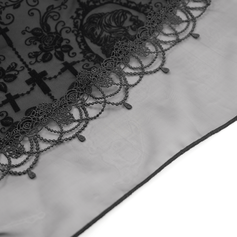 Intricate black lace trim with floral designs and elegant scalloped edge, perfect for gothic fashion accents.