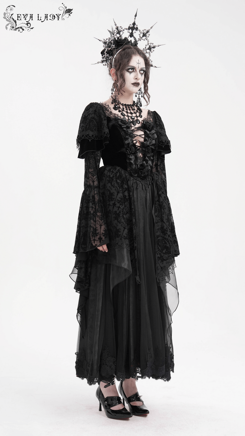 Elegant black Gothic dress with lace and bell sleeves, featuring a ruffled bodice and dramatic layered skirt.