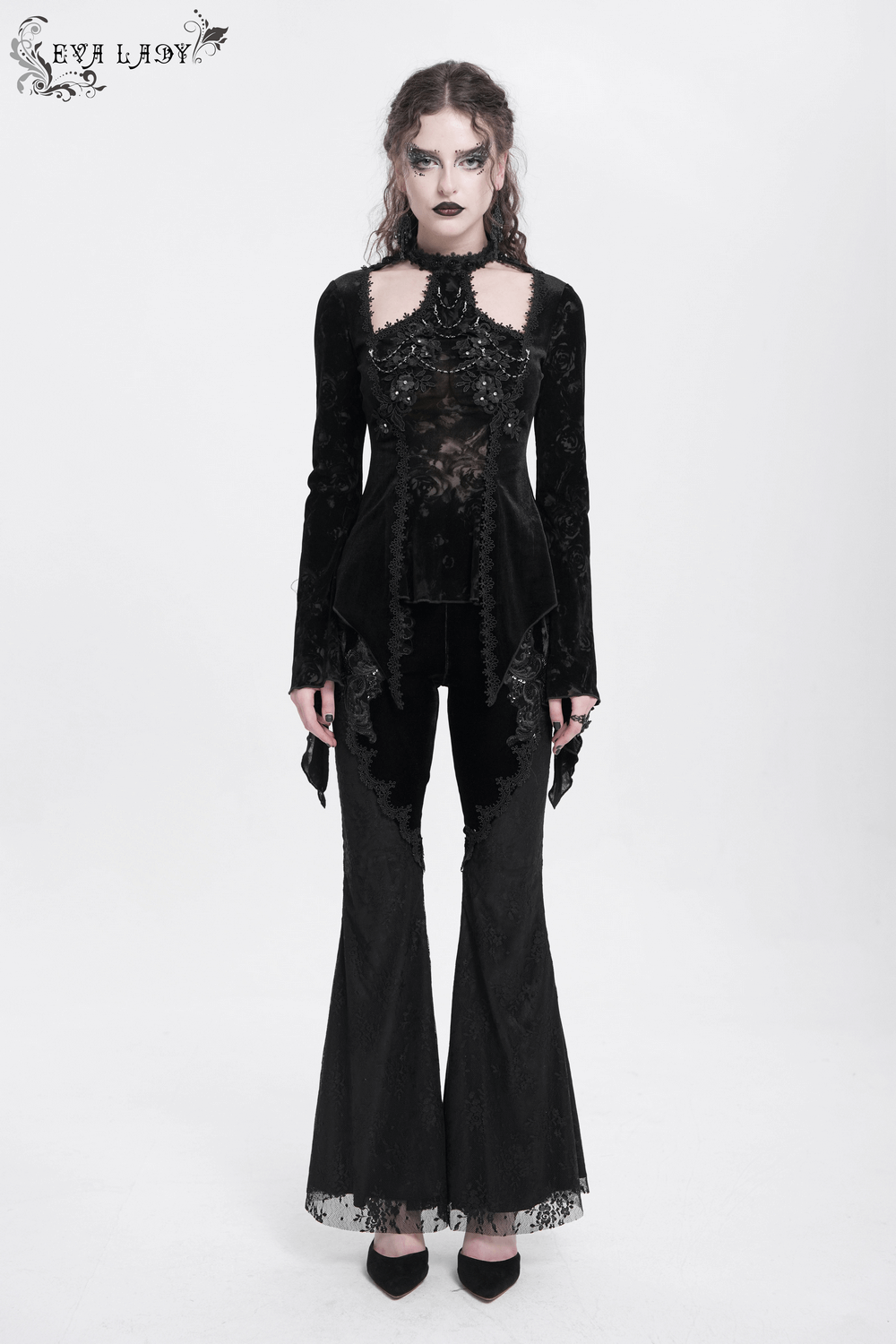 Chic gothic top with lace and pearl details, paired with stylish flared pants for a dark elegance look.