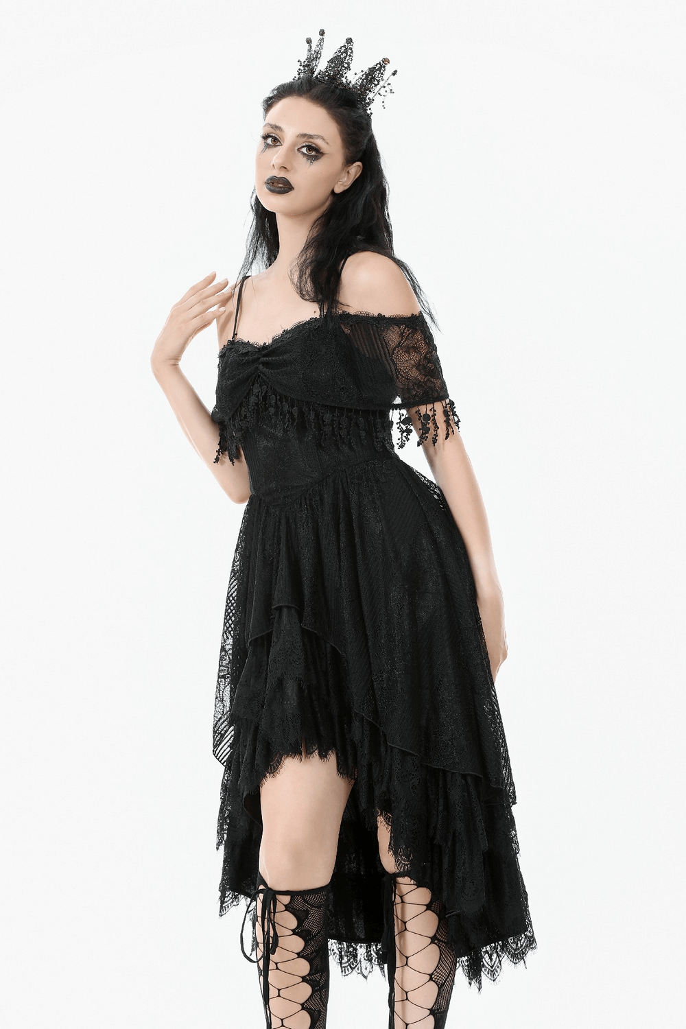 Chic Lace Off-Shoulder Dress with Corset and Ruffle Details worn by model in dramatic pose.