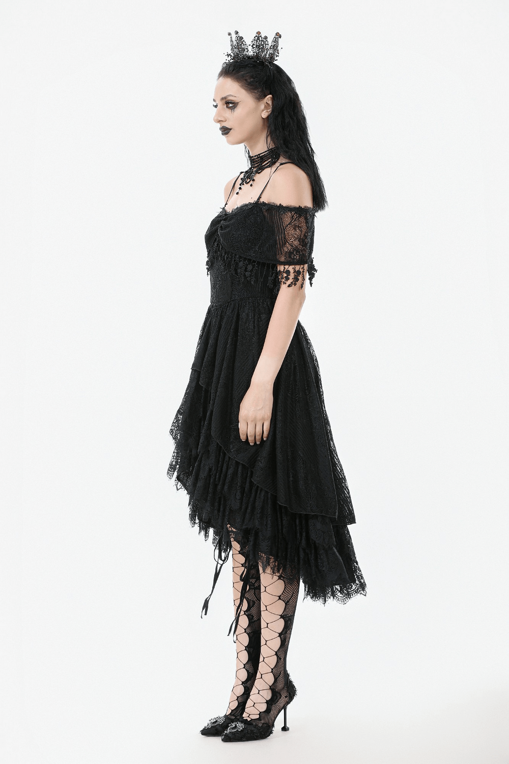 Chic Lace Off-Shoulder Dress with Corset and Ruffle Details modeled by a woman in a gothic crown and lace-up heels.