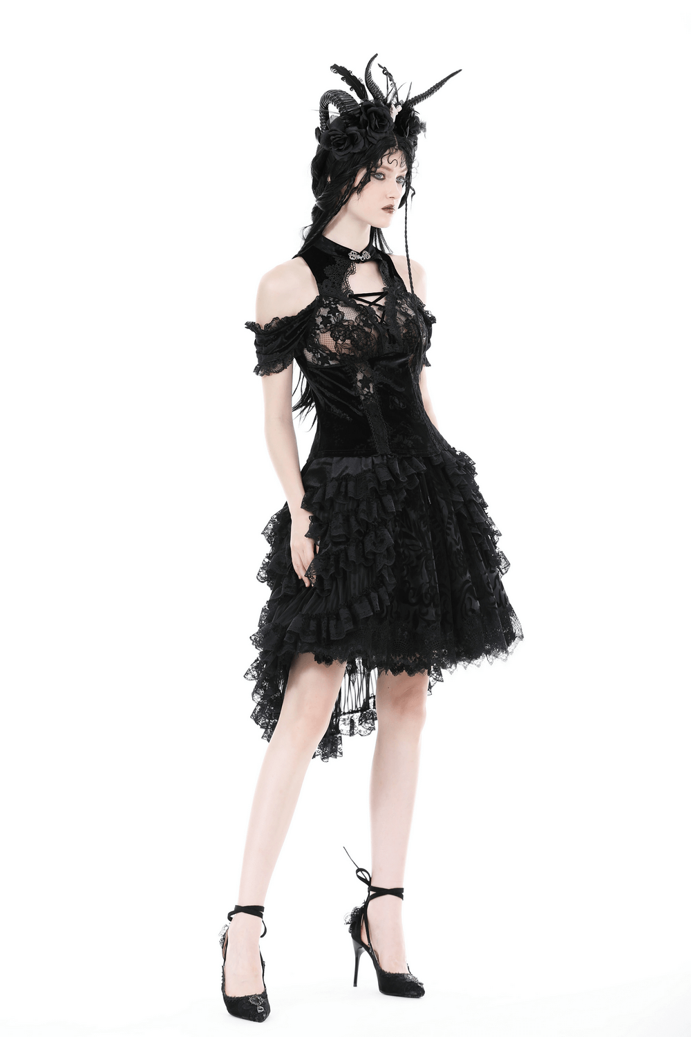 Elegant black lace off-the-shoulder dress with ruffles and intricate patterns, styled for a modern gothic look.