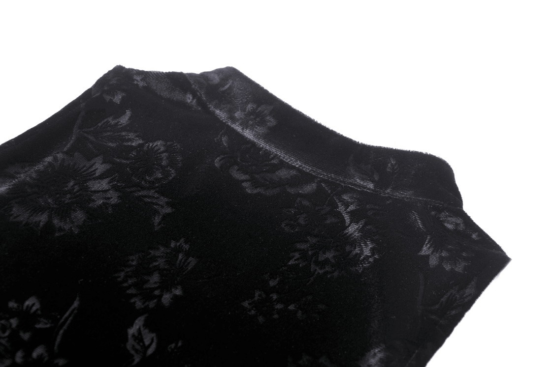 Elegant black lace top featuring intricate floral patterns and a stylish cold shoulder design.