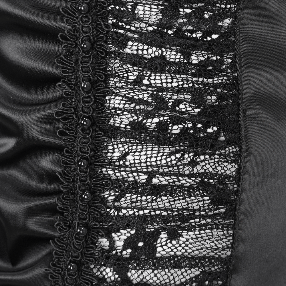 Close-up of gothic black lace trim on luxurious satin fabric, showcasing intricate detailing and texture.