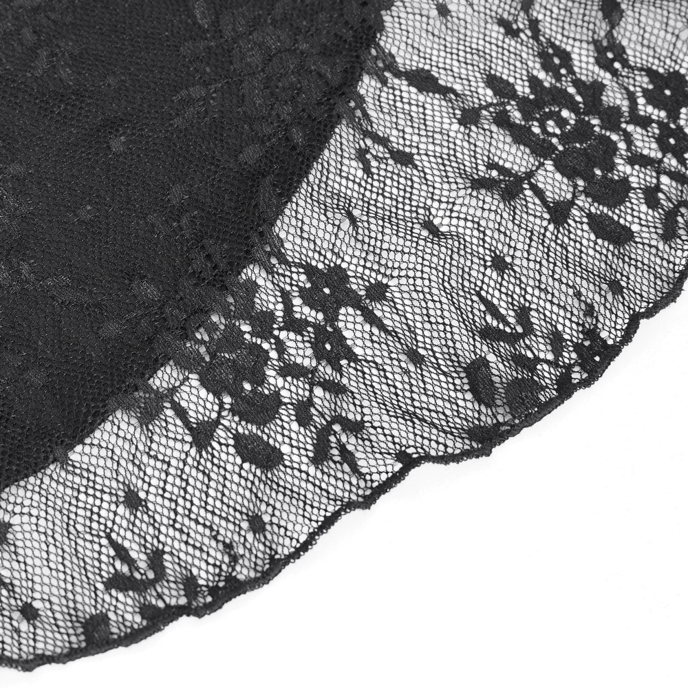 Close-up of elegant black lace trim showcasing floral patterns and delicate details.