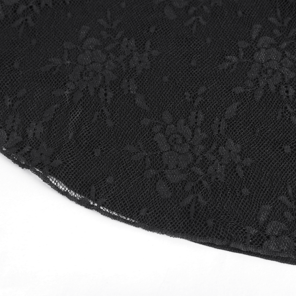 Close-up of gothic black lace fabric with floral patterns, perfect for chic evening wear.
