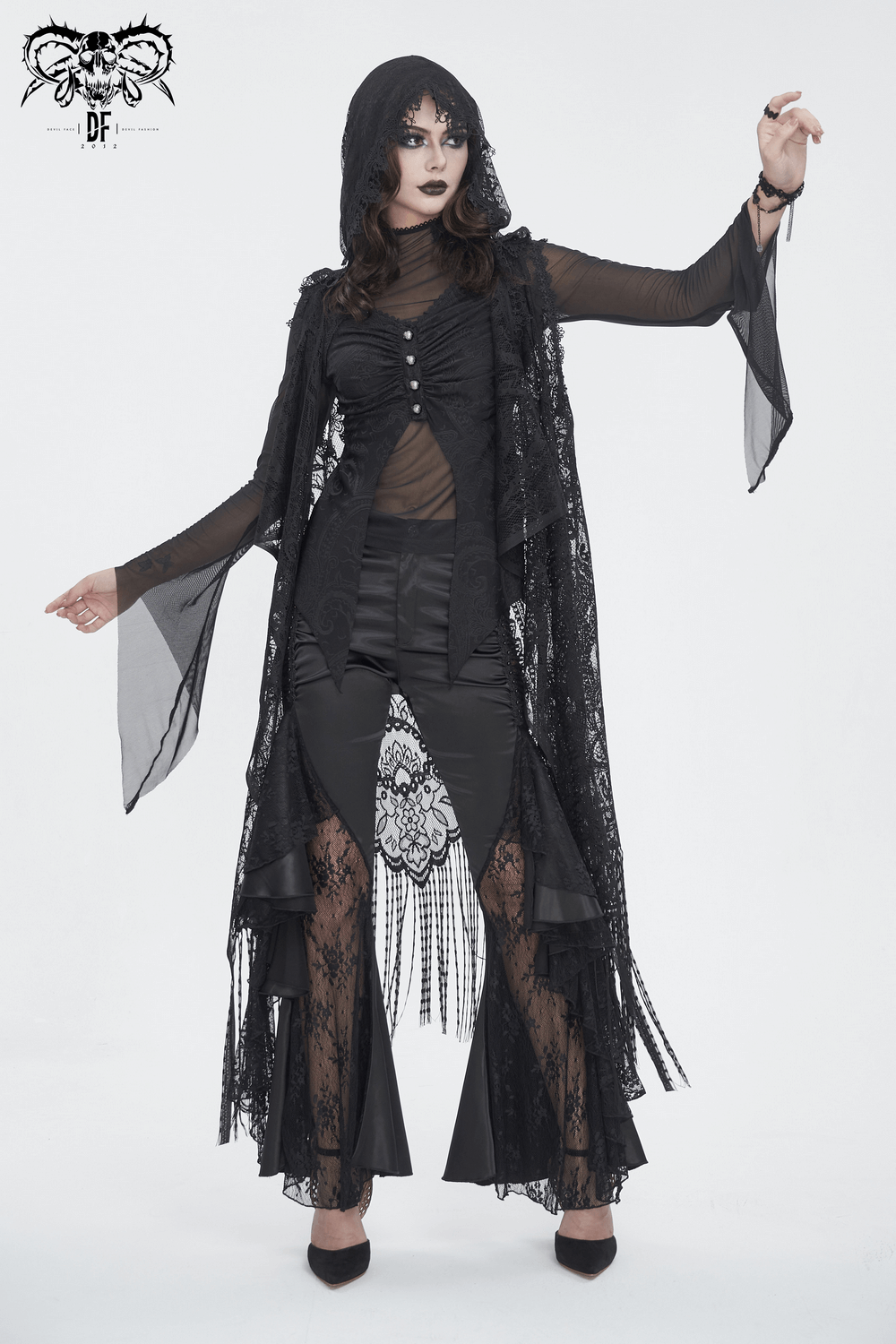Gothic black lace-paneled flared pants with a dramatic lace cape, perfect for darkly elegant evenings.