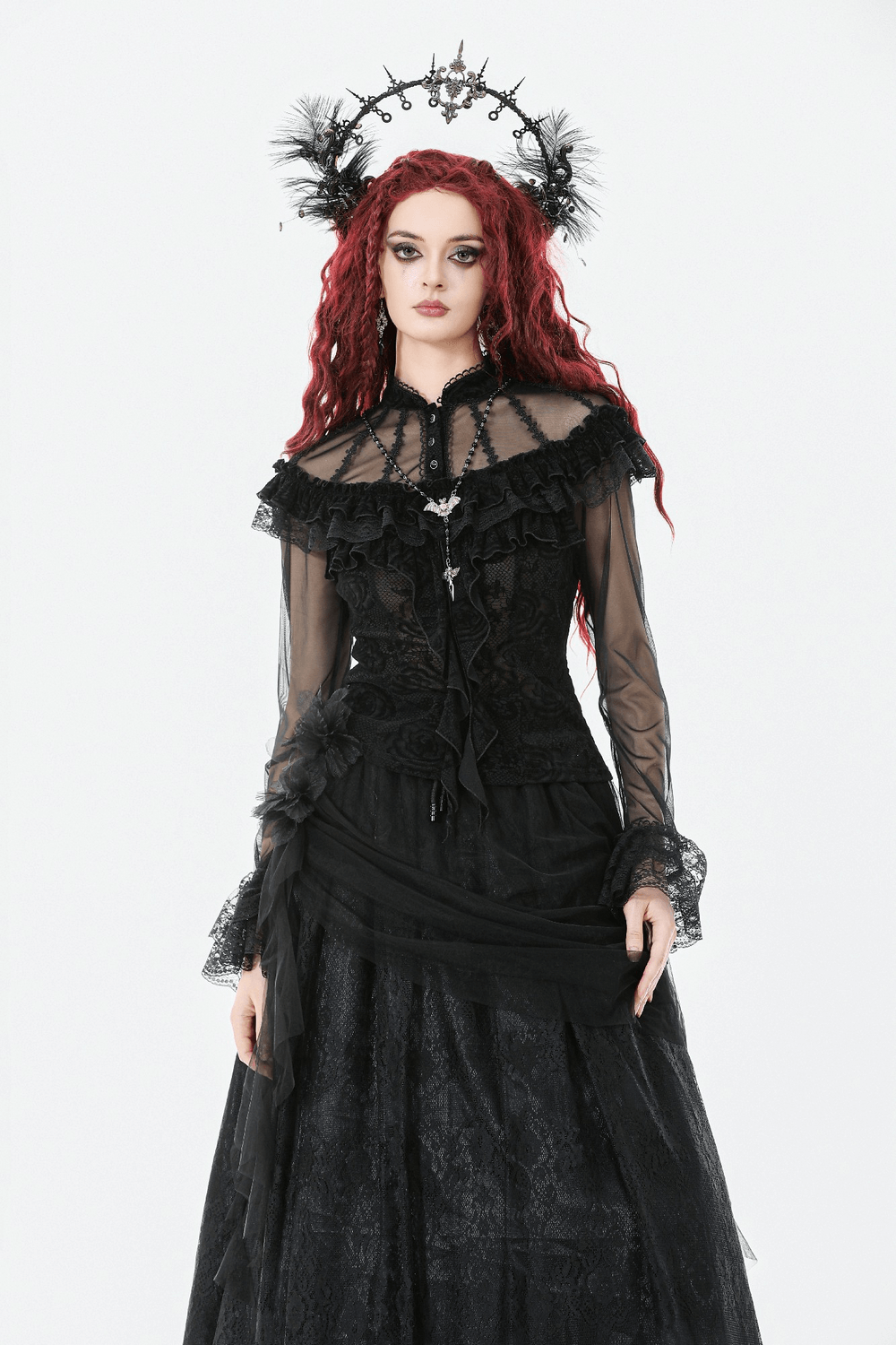 Chic Lace Sheer Top with Ruffled Off Shoulder Design worn by a model in a striking black outfit.