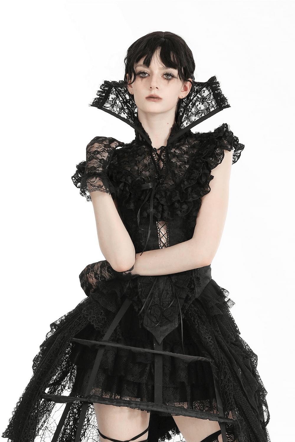 Chic Gothic black lace cape with ruffled collar worn by model, showcasing intricate details and Victorian elegance.