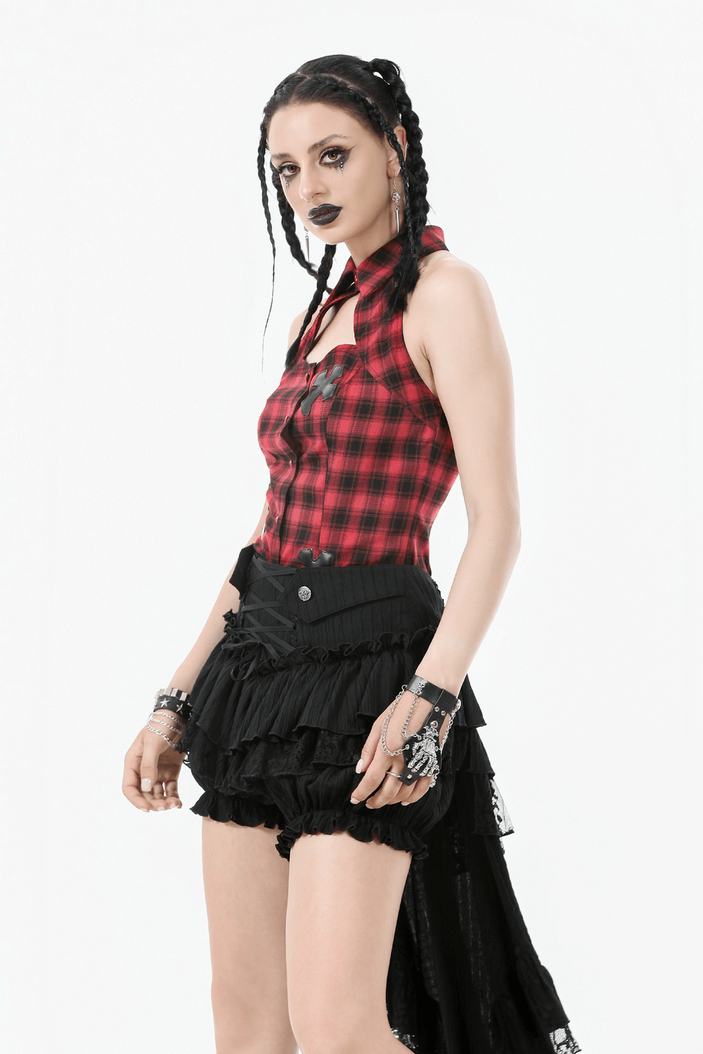 Chic Layered Ruffle Tailcoat Lantern Shorts for Women styled with a plaid top and edgy accessories.