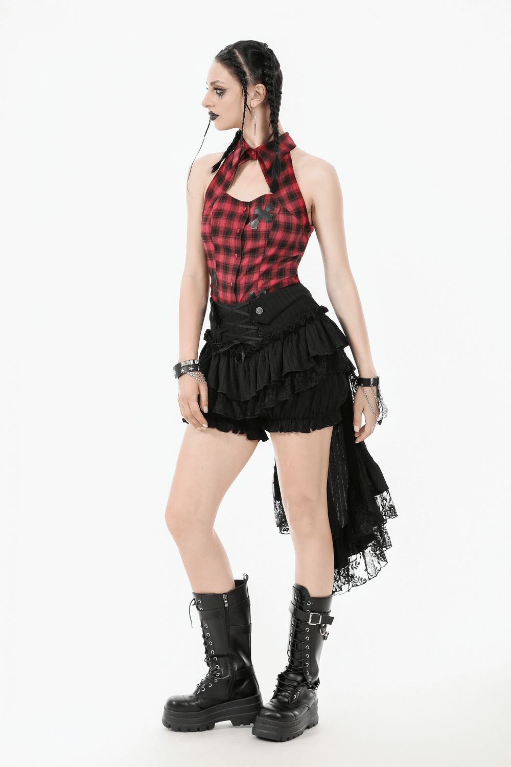 Chic Layered Ruffle Tailcoat Lantern Shorts for Women styled with a plaid top and combat boots.