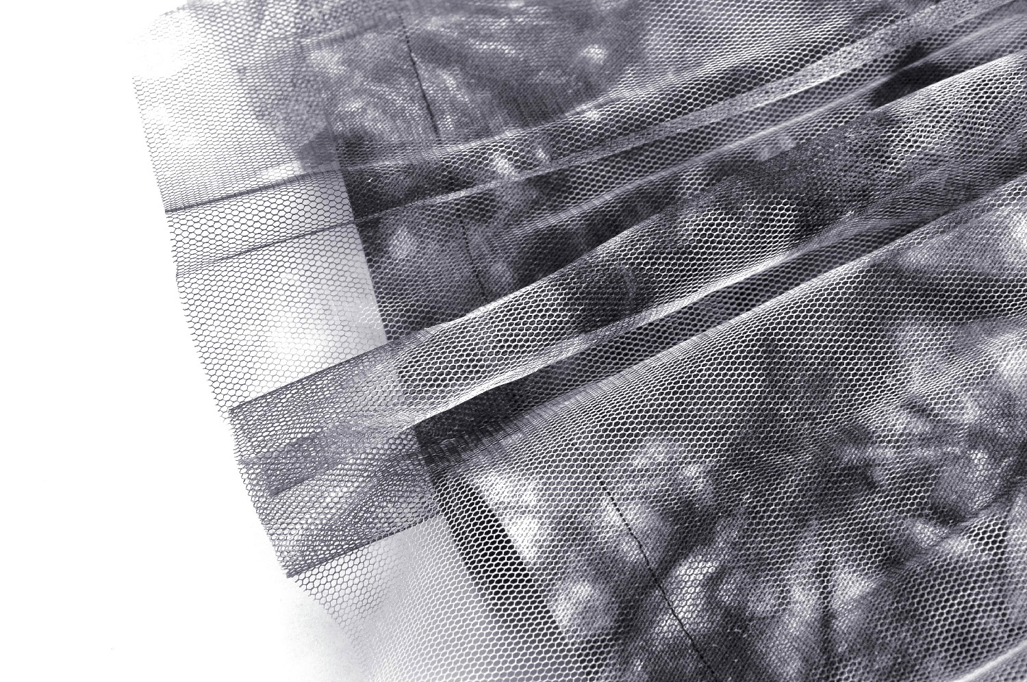 Chic marble print skirt fabric showcasing a trendy black and gray design, perfect for a stylish outfit.