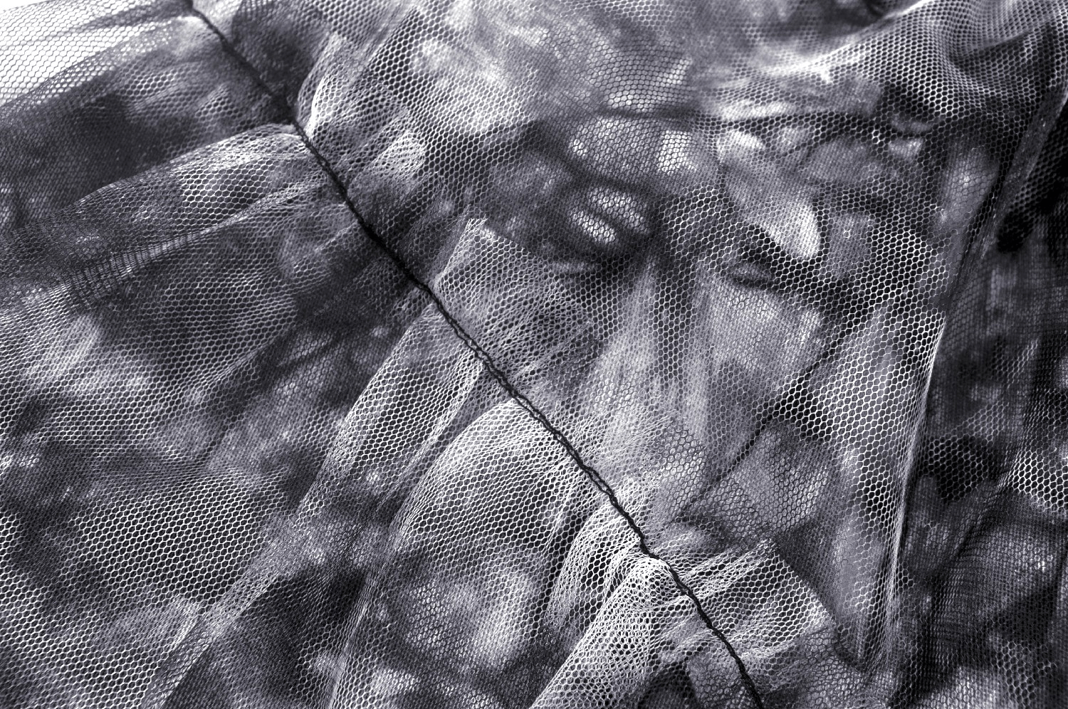 Chic marble print fabric showcasing elegant patterns for a trendy skirt design.