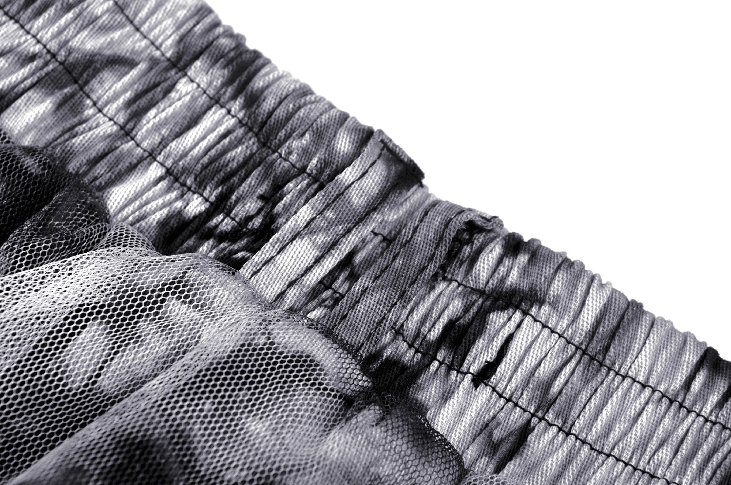 Close-up of a chic marble print skirt waistband showcasing its stylish lightweight fabric and unique texture.