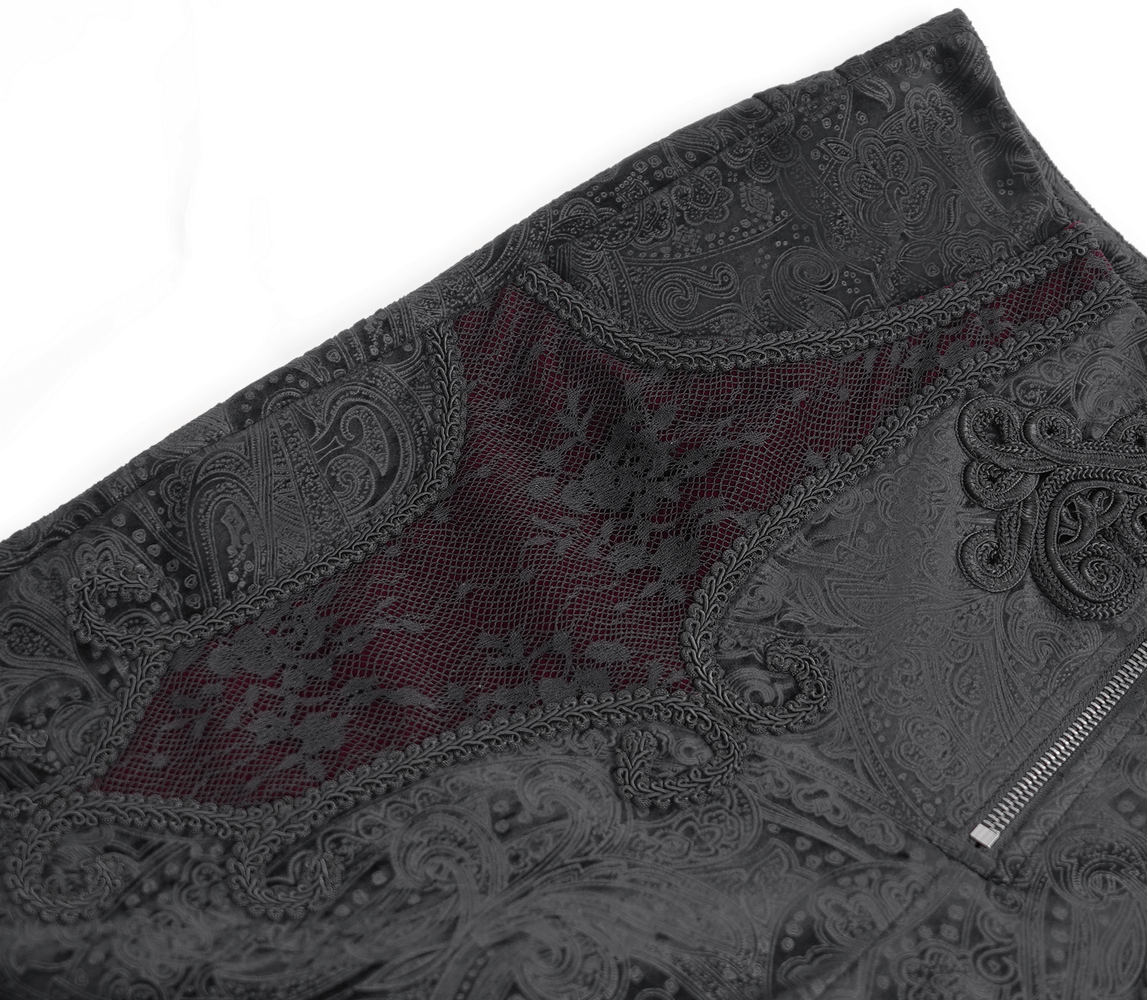 Close-up of chic black jacquard fabric with intricate lace accents, showcasing elegant detail and luxurious texture.