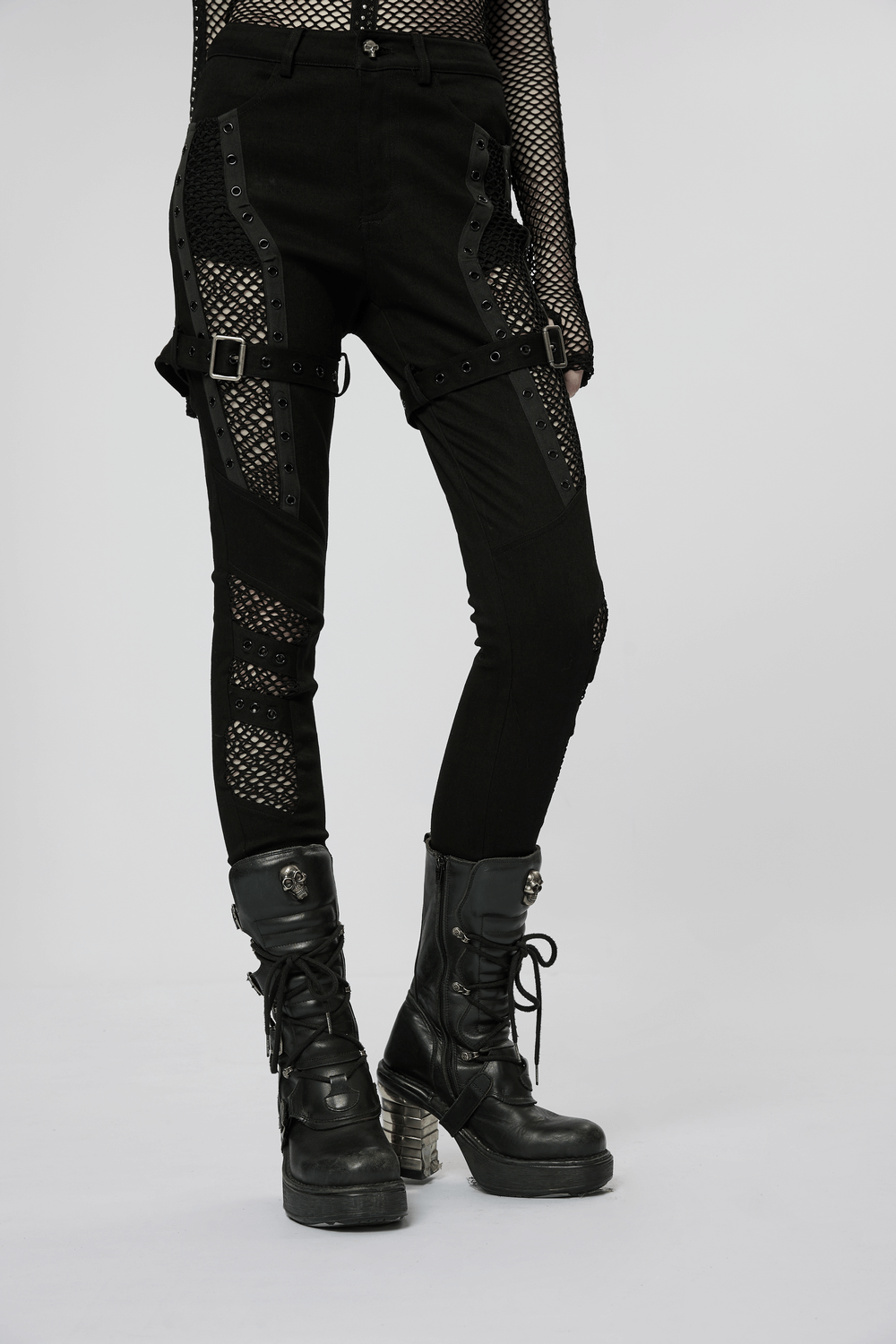 Chic gothic style trousers with mesh inserts and eyelets, perfect for edgy punk fashion.