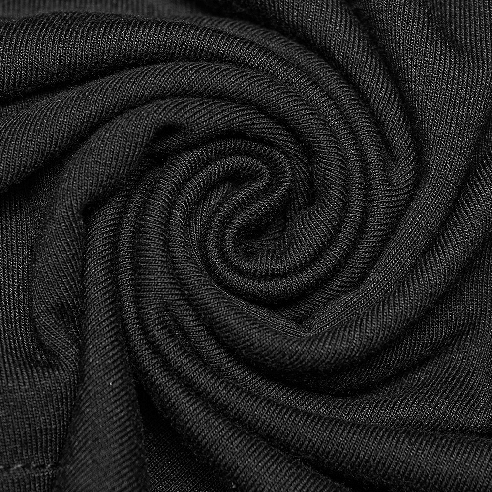 Close-up of soft black fabric with a spiral design, perfect for stylish and edgy clothing.