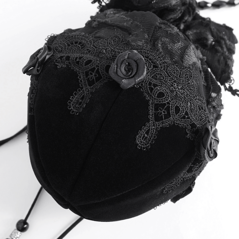 Chic black lace evening bag with intricate lace details and elegant bead-chain strap.