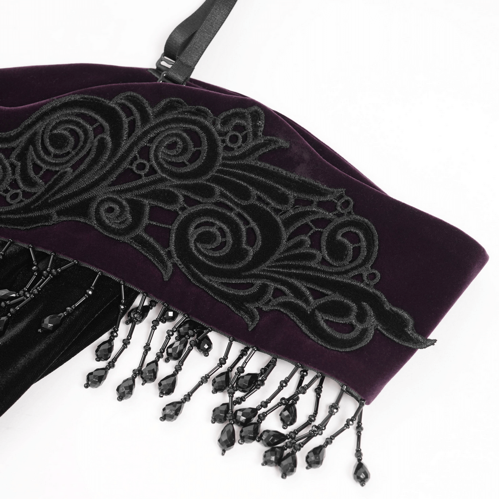 Chic Off-Shoulder Dress with Lace-Up Back and Fringes detailed view showing intricate black embroidery and fringed beading.