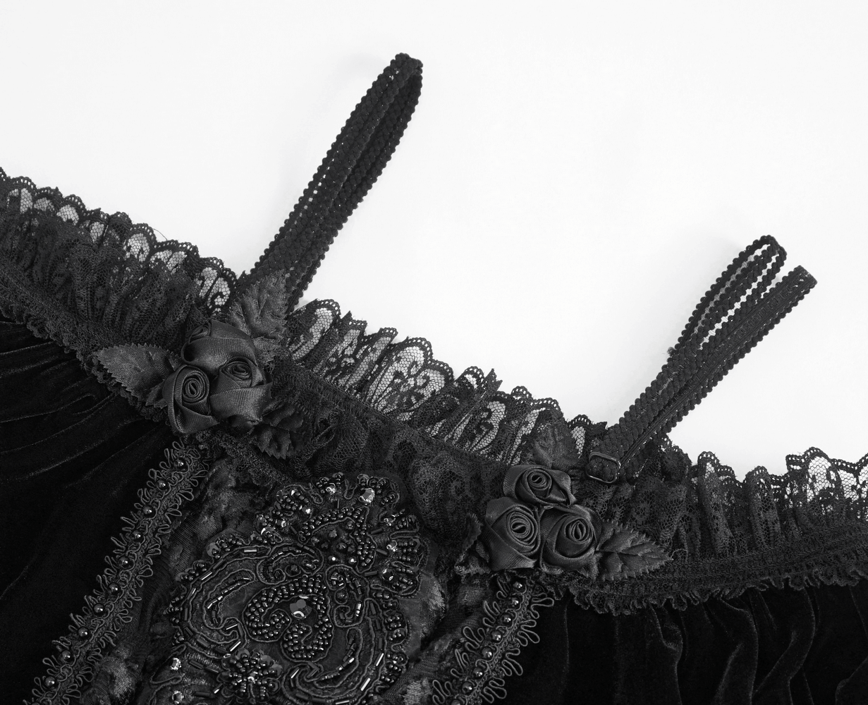 Elegant black lace and velvet camisole with delicate floral embellishments and intricate detailing.