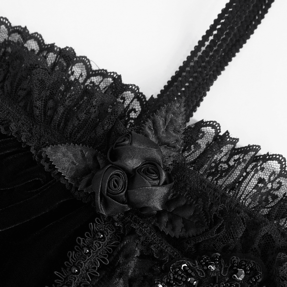 Close-up of black lace with fabric roses and intricate detailing, perfect for a chic gothic-inspired look.