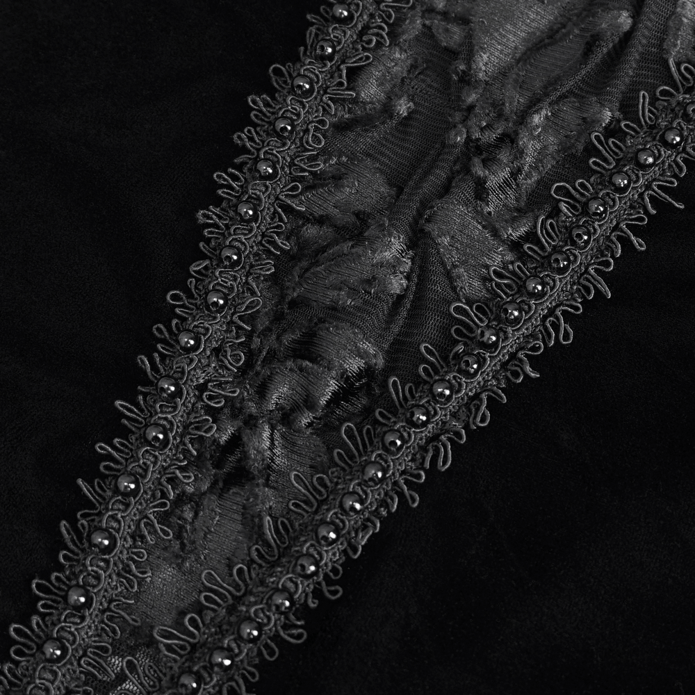 Close-up of intricate black lace detailing with beaded accents for a chic gothic look.