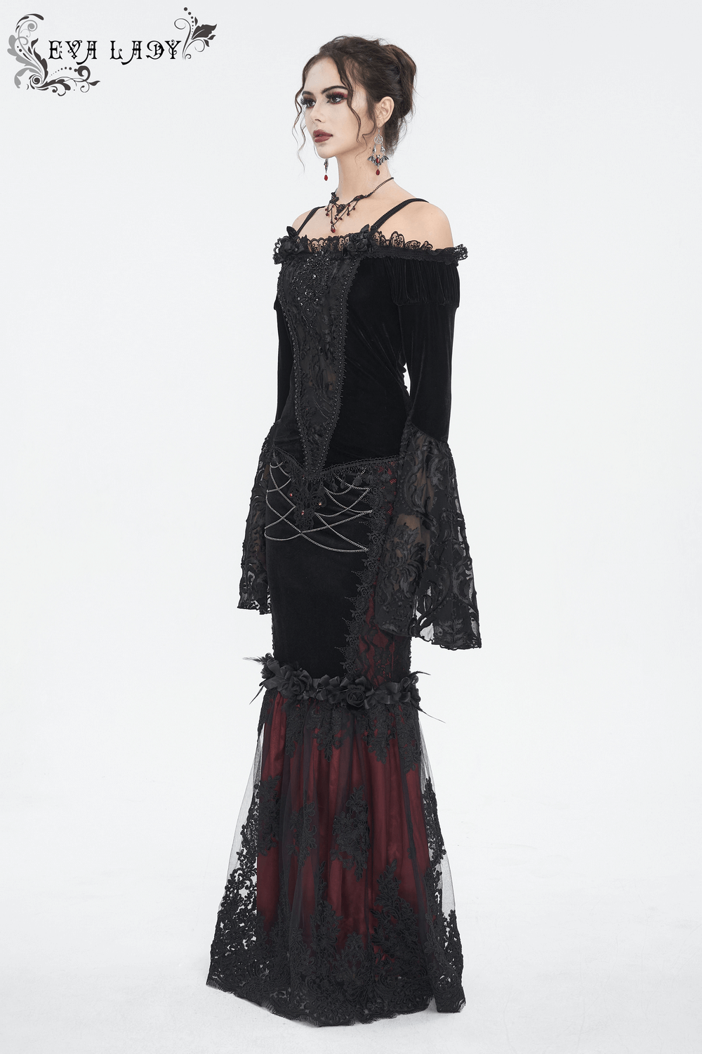 Chic off-the-shoulder black lace top with bell sleeves and fringe, perfect for gothic romantic style.
