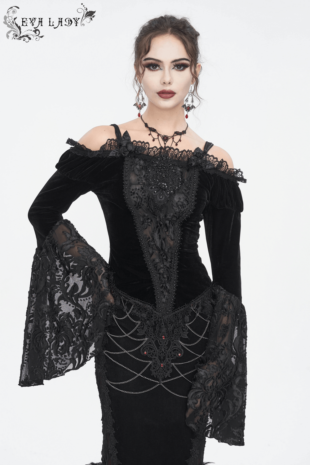 Chic off-the-shoulder black lace top with long bell sleeves, perfect for gothic romance and dramatic evenings.