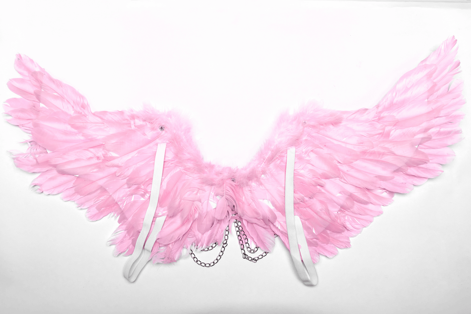 Chic pink feathered angel wings harness with silver chains for festive events and parties.