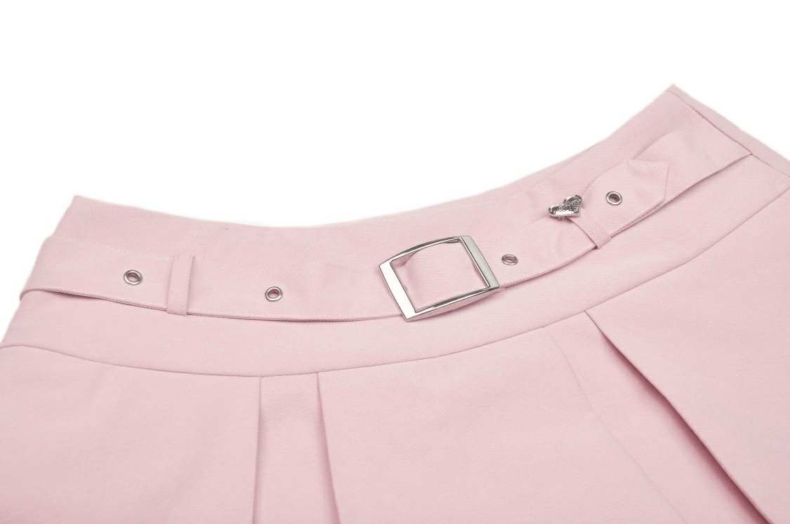 Chic pastel pink pleated skirt waistband with silver buckle and lace detail, perfect for stylish outfits.