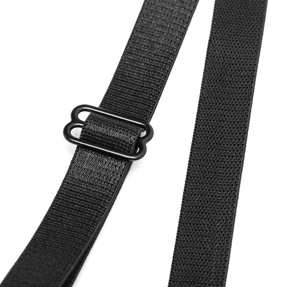 Black adjustable straps with hardware detail for chic clothing designs.