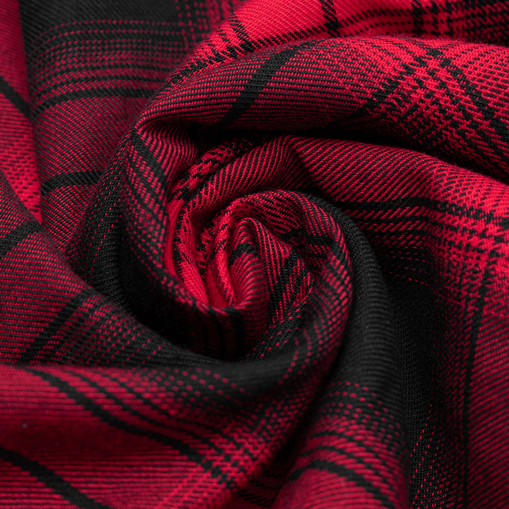 Close-up of red and black plaid fabric, perfect for stylish A-line dresses and chic fashion pieces.