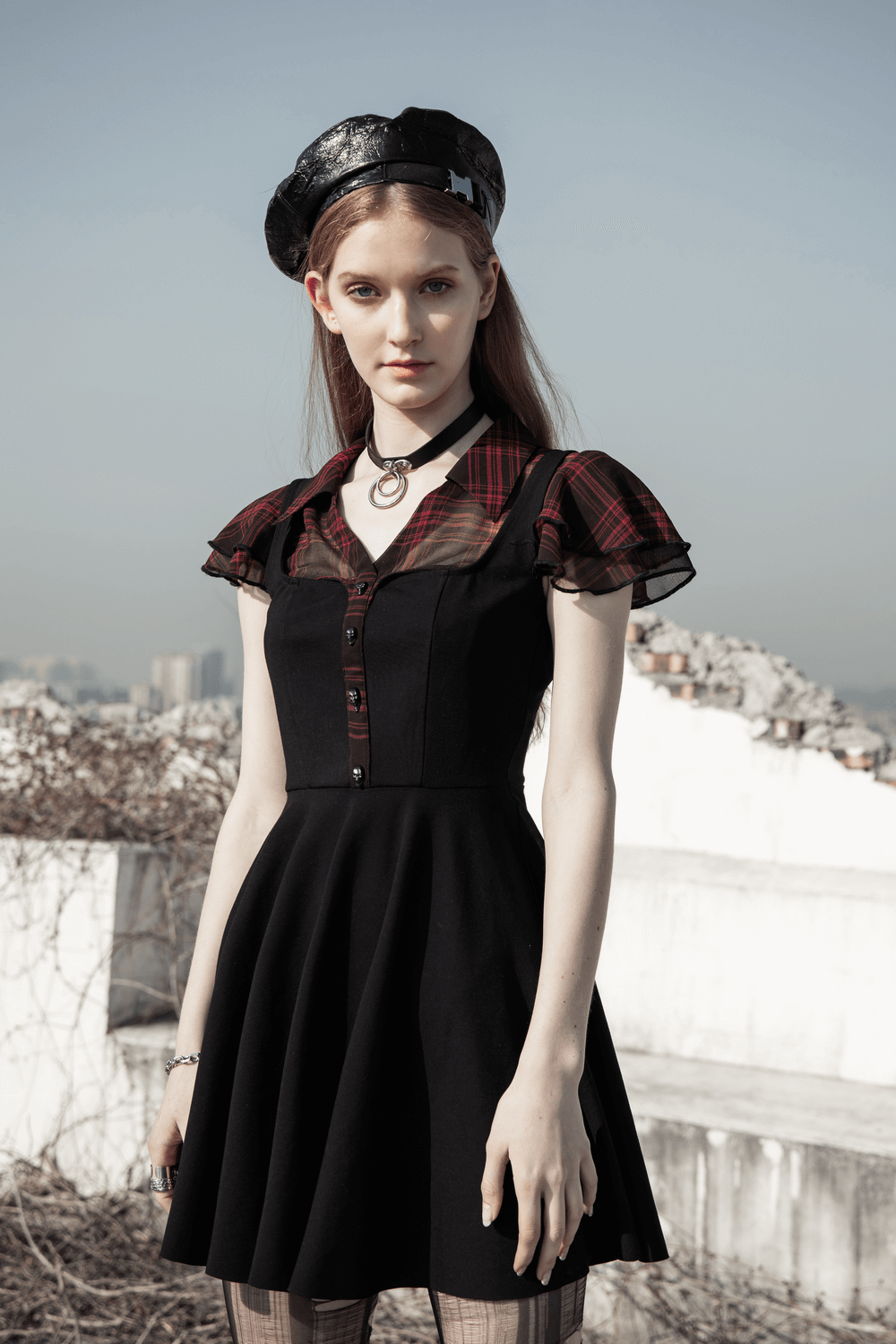 Chic Gothic A-Line dress with plaid falbala sleeves and rivets, embodying unique style and elegance.