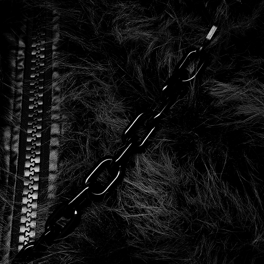Close-up of chic punk faux fur jacket featuring a zipper and detachable bright chain.
