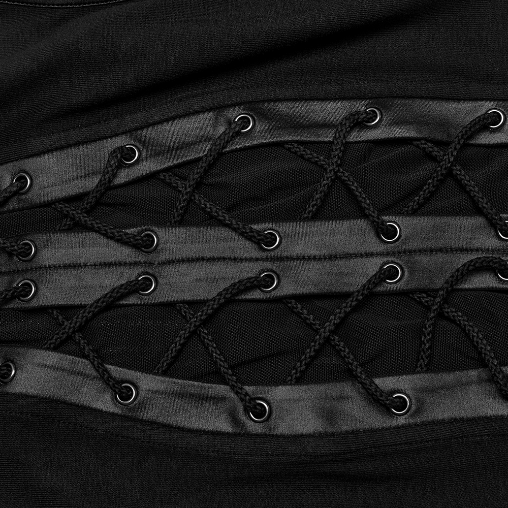 Close-up of the chic punk lace-up detail on a black crop top with mesh splicing and eyelet grommets.