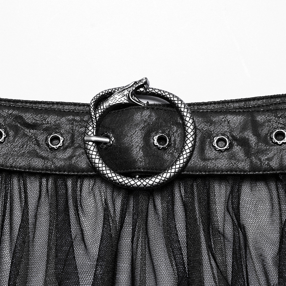 Close-up of punk-inspired black mesh skirt belt with unique snake buckle detail.