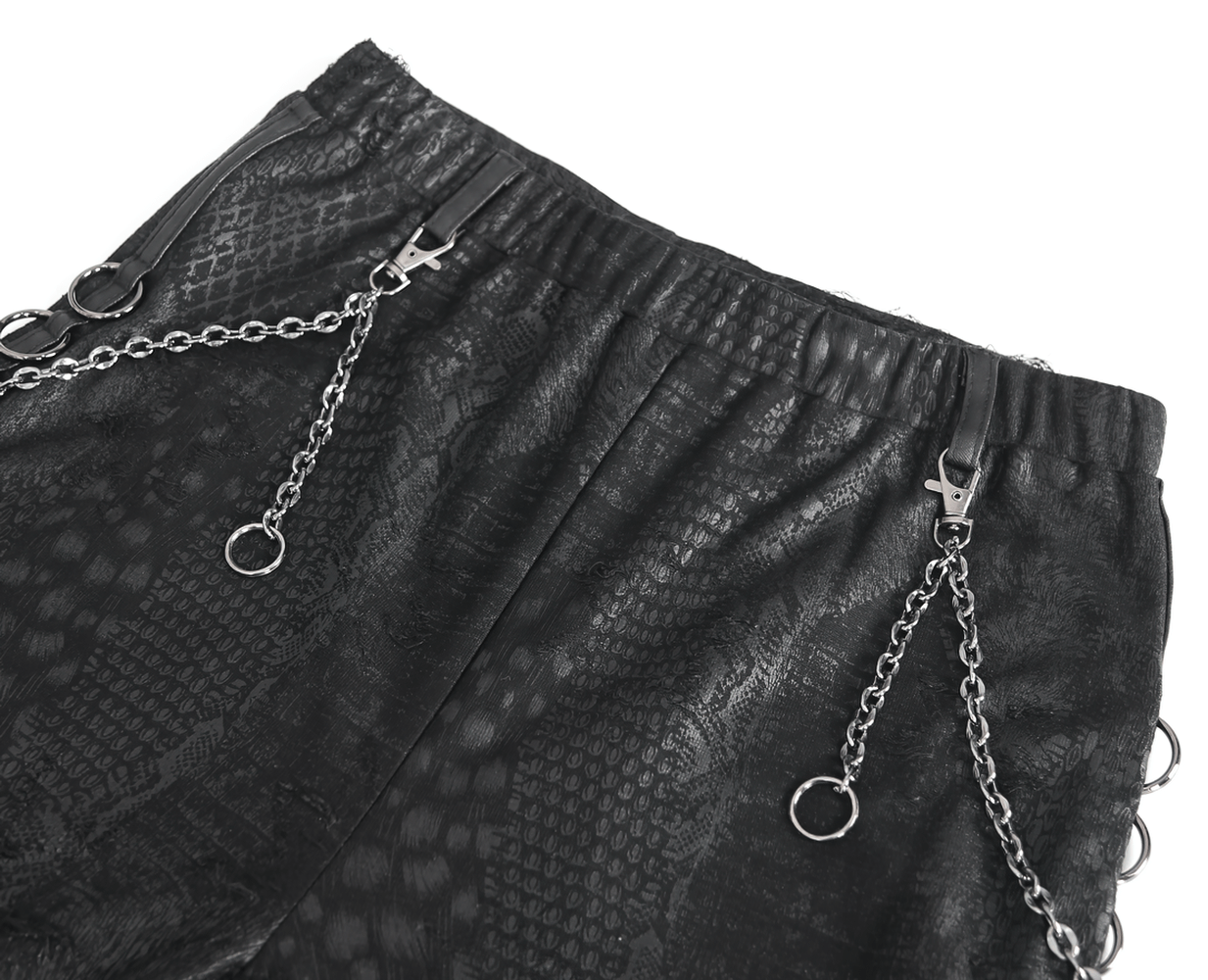 Chic black snake print leggings featuring edgy chains for a stylish look.