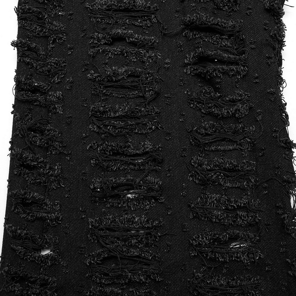 Close-up of chic ripped black mesh fabric, showcasing the gothic style and unique distressed design.