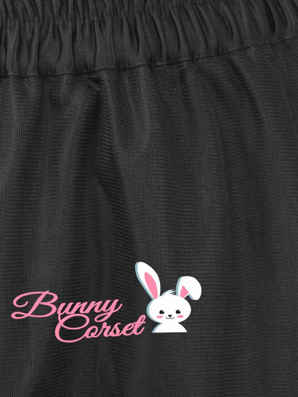 Black fabric with Bunny Corset logo featuring a cute bunny graphic, perfect for playful fashion.