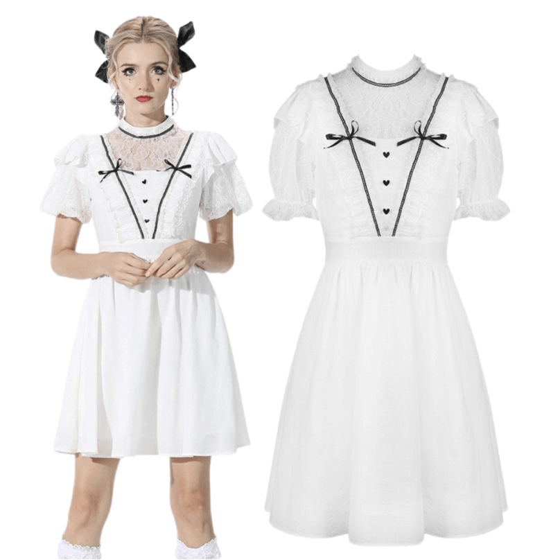 Chic white A-line dress with puff sleeves and lace trim, featuring black ribbon accents for a stylish look.