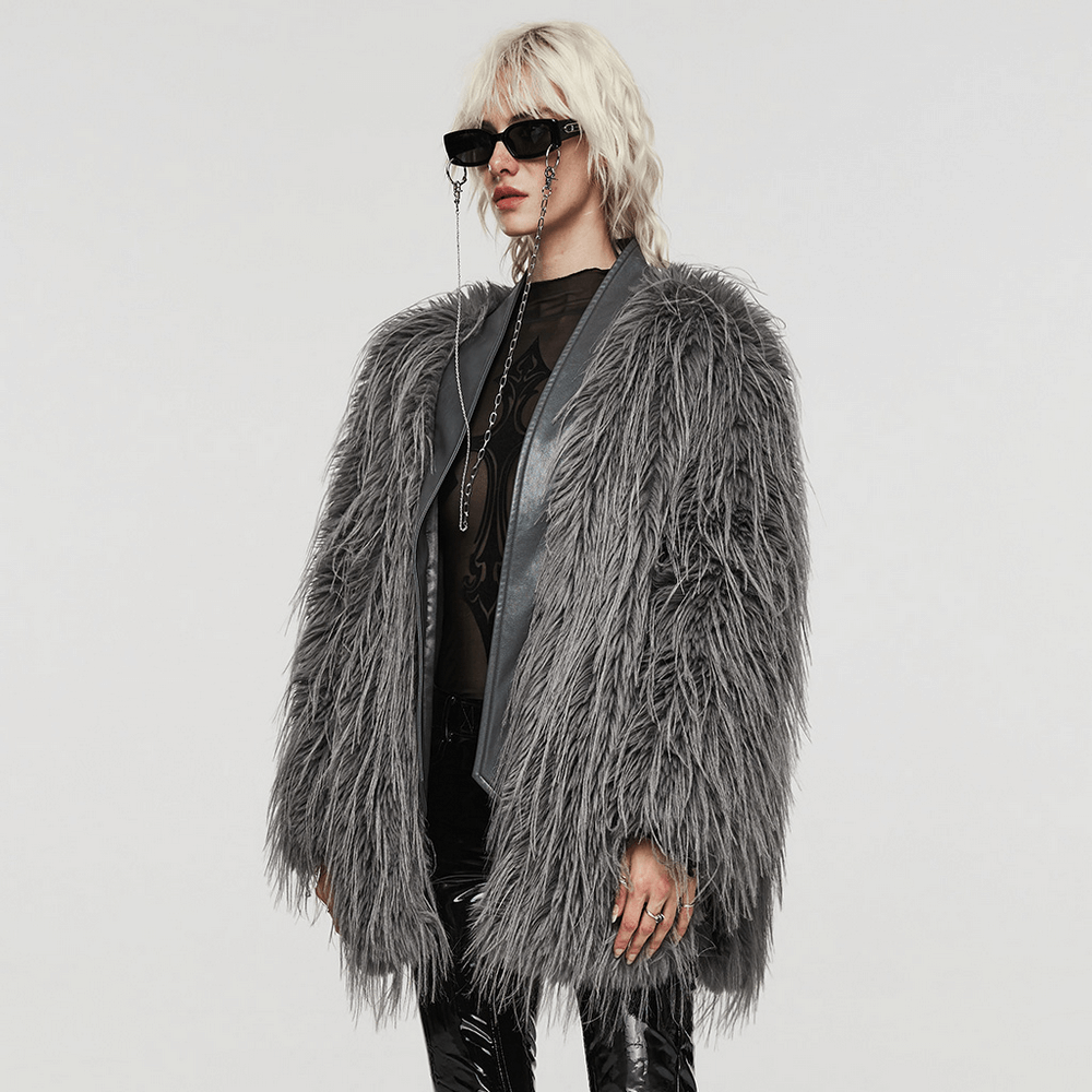 Chic grey staggered faux fur coat with leather detailing, offering effortless elegance and warmth in a stylish design.