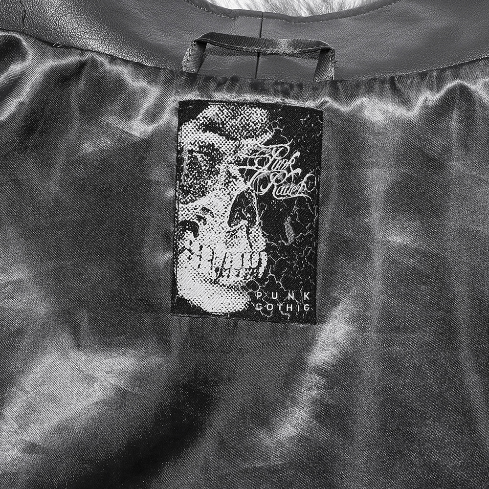 Close-up of a black faux fur coat label featuring a skull design, emphasizing punk gothic style.