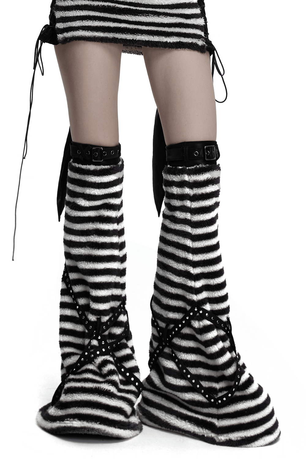 Chic striped plush leg warmers with cross straps, perfect for adding style and warmth to any outfit.