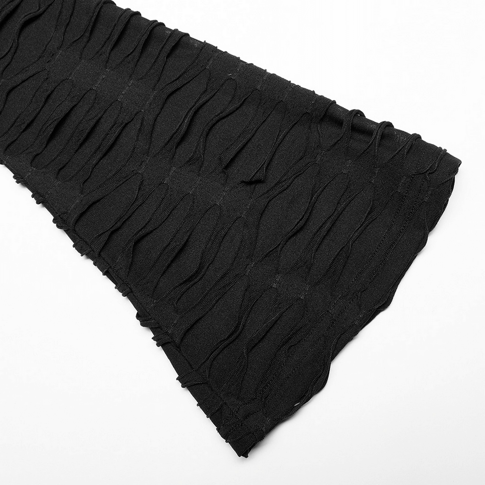 Close-up of black mesh fabric with twist-front design, showcasing texture for gothic crop top fashion.