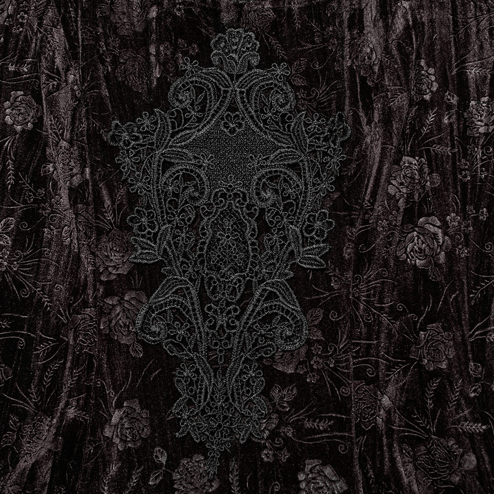 Intricate lace embroidery on dark velvet fabric with rose texture, perfect for gothic or vintage styles.